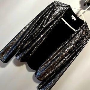 Just fab, sequined, black holiday jacket